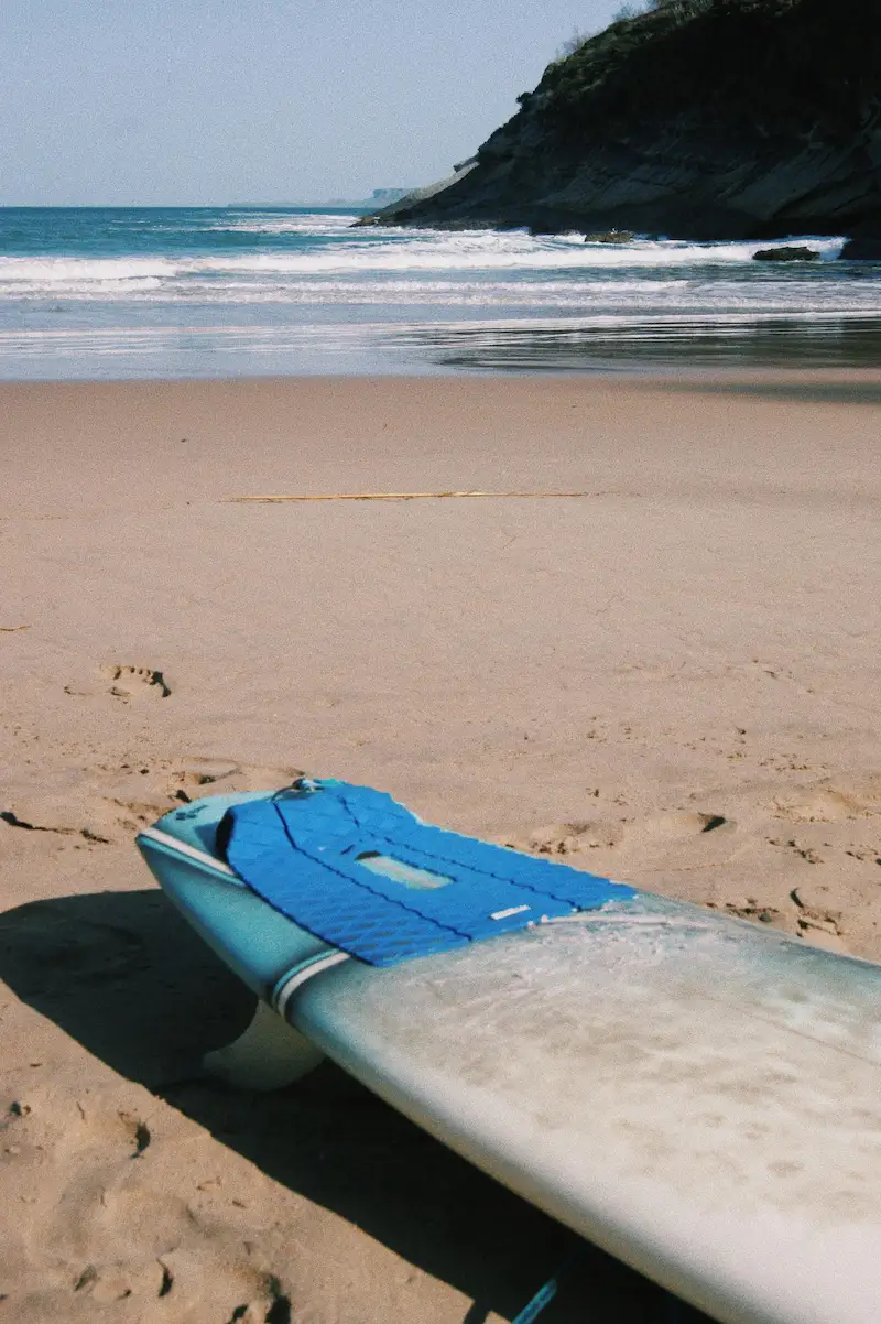 Surfboards resting on sand in Tamraght Morocco before a surf session begins