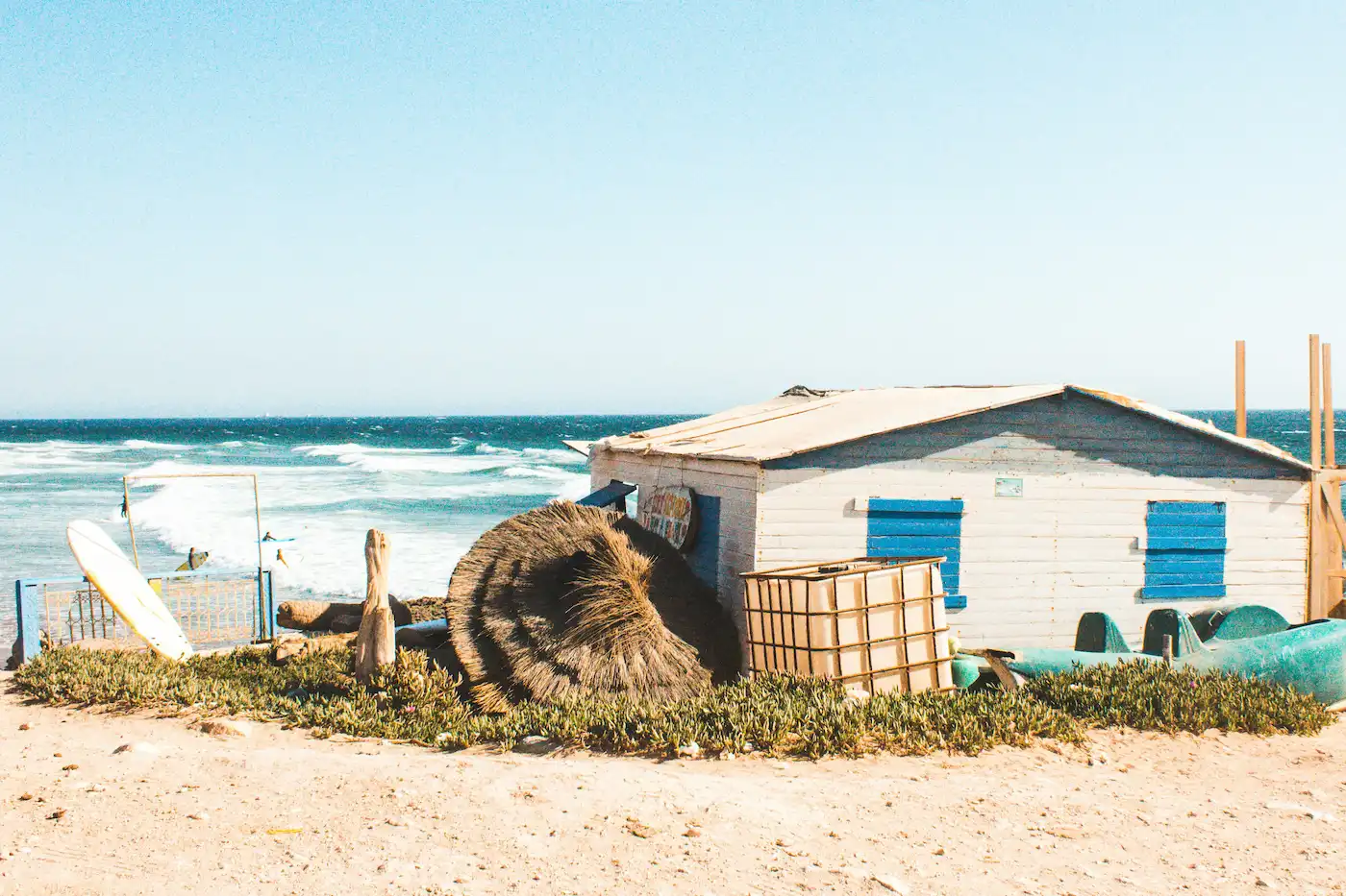 Simple surf shack by the ocean in Tamraght Morocco with Atlantic waves and local coastal lifestyle